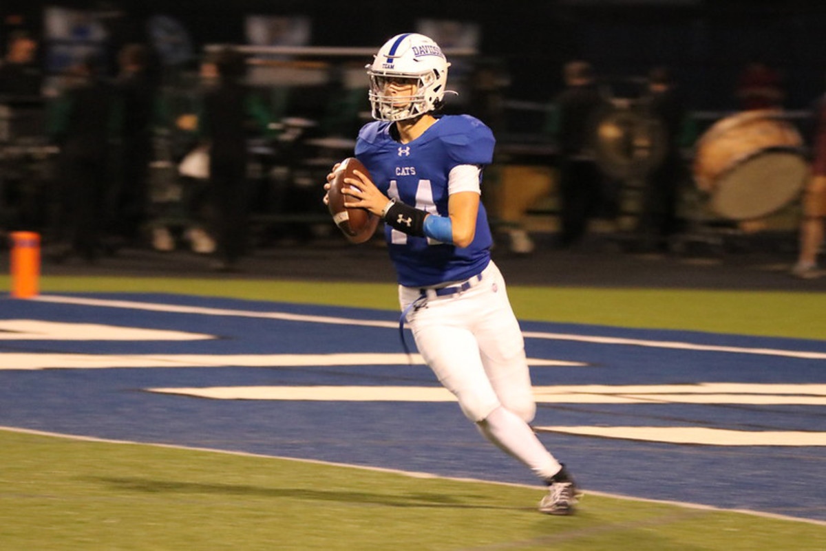 Johnny DiBlasio rolls out to attempt a pass for Hilliard Davidson (photo courtesy of the DiBlasio family)