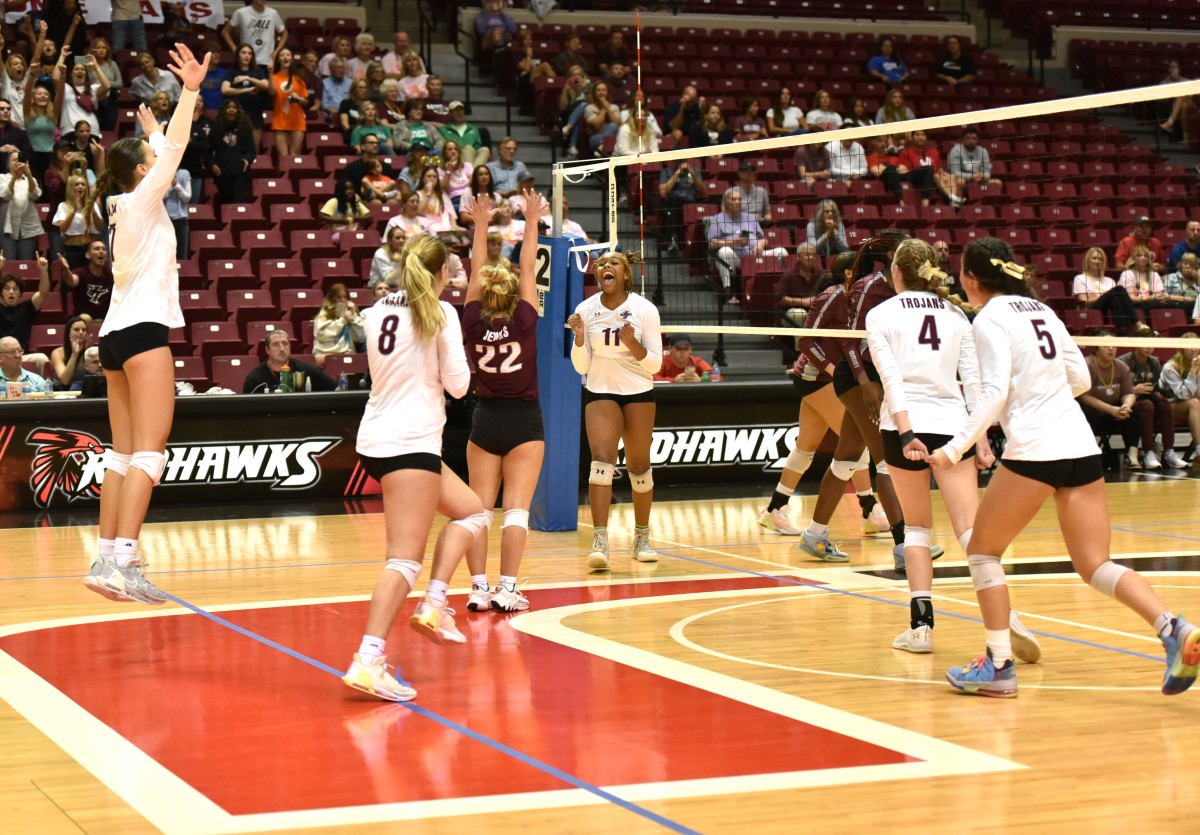 Jenks players celebrate during the Class 6A state championship match Oct. 21, 2023. 