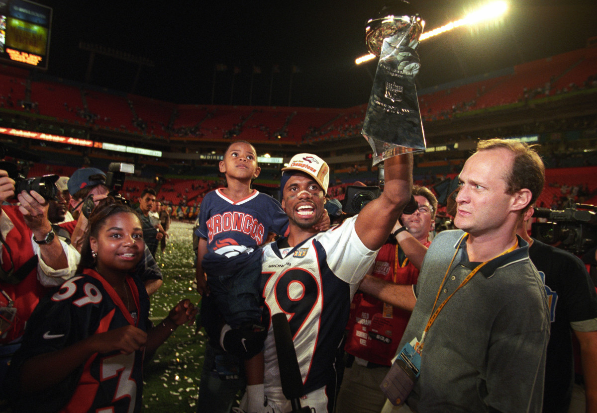 Denver Broncos cornerback Ray Crockett (39) celebrates on the field after defeating the Atlanta Falcons during Super Bowl XXXIII at Dolphin Stadium. The Broncos defeated the Falcons 34-19. 