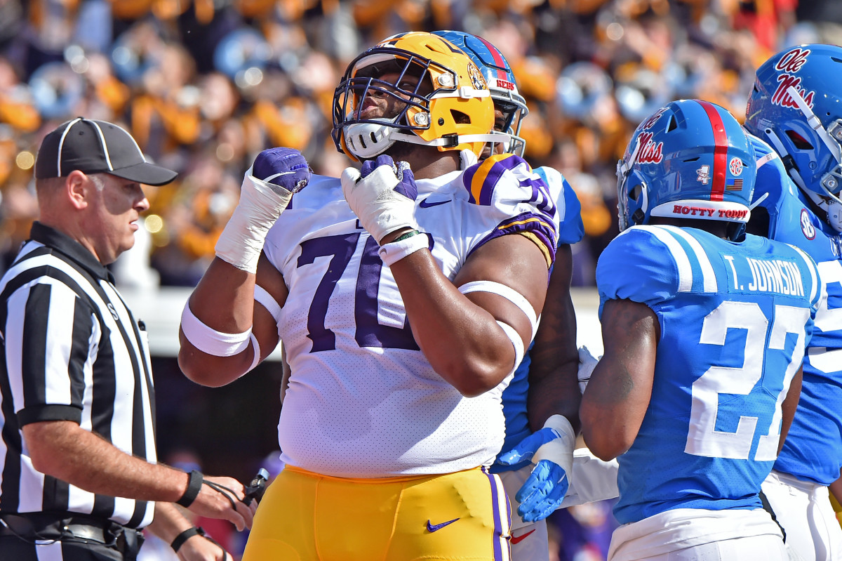 LSU Tigers guard Ed Ingram (70) reacts after a touchdown against the Mississippi Rebels during the first half at Vaught-Hemingway Stadium.