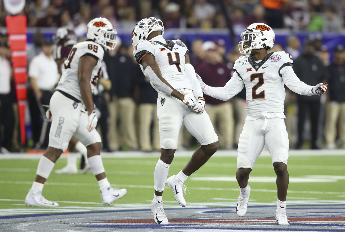 A.J. Green (4) celebrates tackling Texas A&M Aggies running back Isaiah Spiller (28) (not pictured) for a loss of yards in the first half at NRG Stadium.