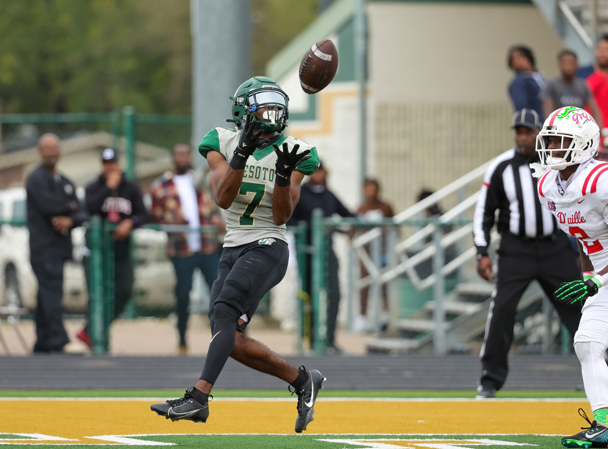 DeSoto receiver Antonio Ride catches a deep ball in the endzone in Saturday's win over top-ranked Duncanville.