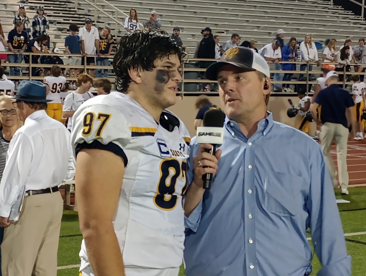 Highland Park senior Henry Richter (97) is interviewed after the Scots' 34-15 win at Richardson on Oct. 26, 2023.