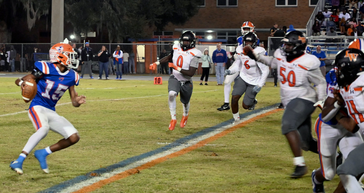 Lake Wales defenders surround and close in on Bartow quarterback Kaleef Valentine Friday. The Highlanders finished the regular season without yielding a rushing touchdown. 