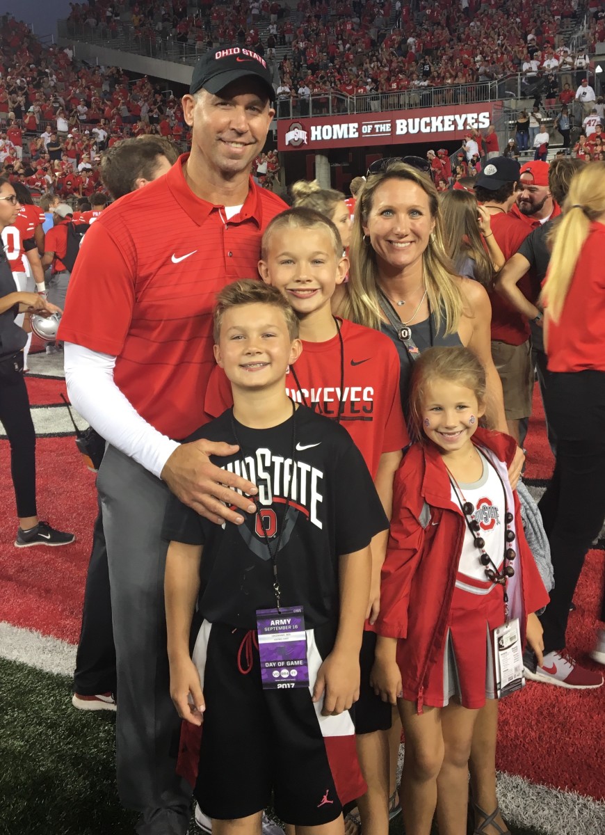 The Uhlenhake family attends an Ohio State football game at Ohio Stadium. 