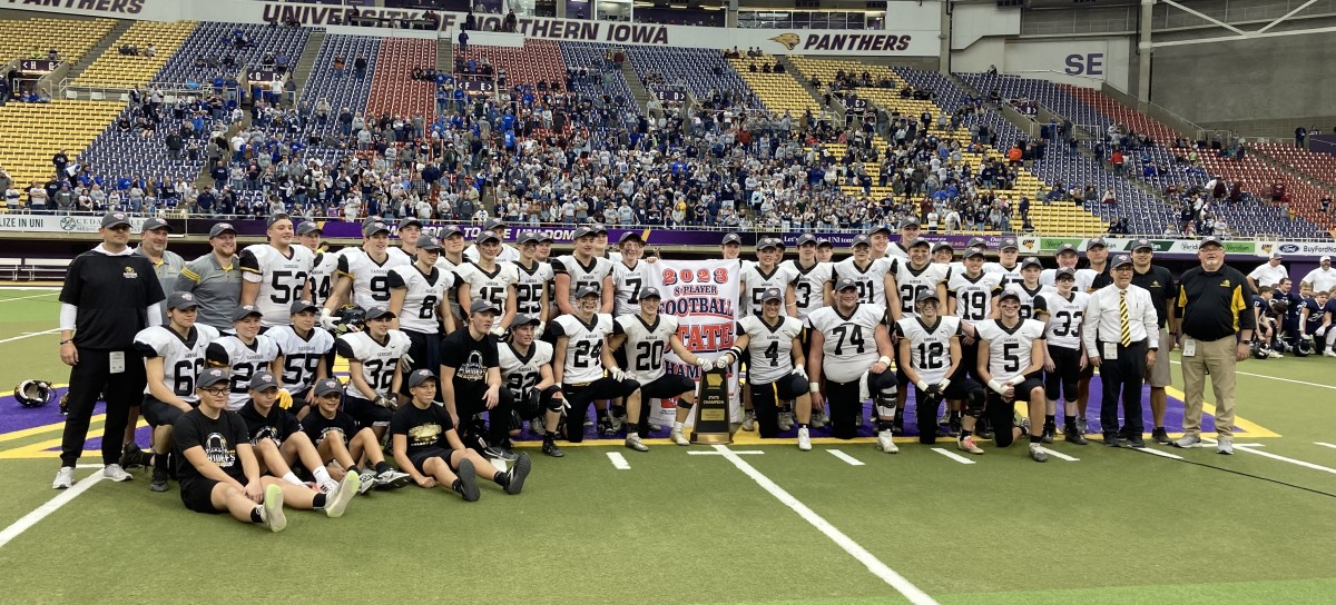 Members of the Bishop Garrigan football team are pictured after winning the 8-player state title.