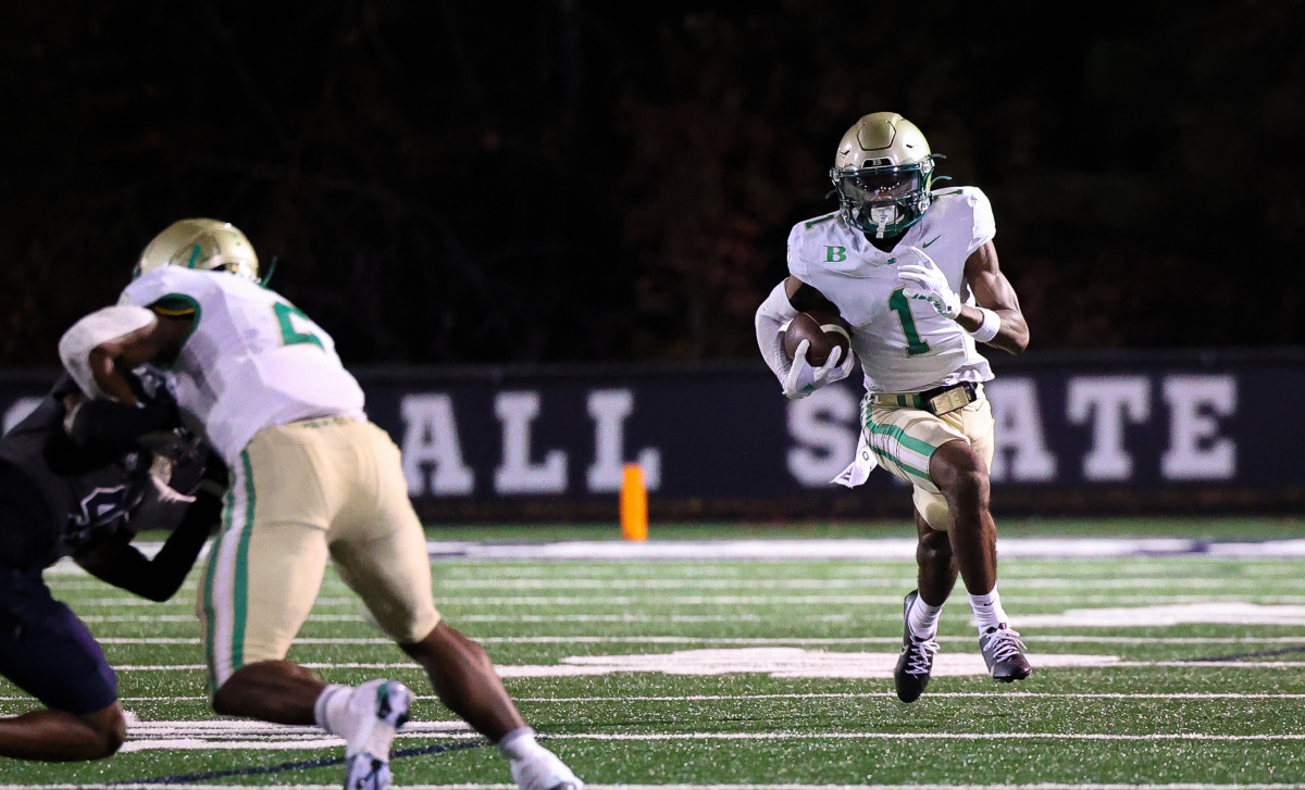 Florida State commit KJ Bolden sprints to towards the end zone with one of his three touchdown receptions, all from Dylan Raiola, as Buford held off Norcross in the Georgia 7A state football playoffs.