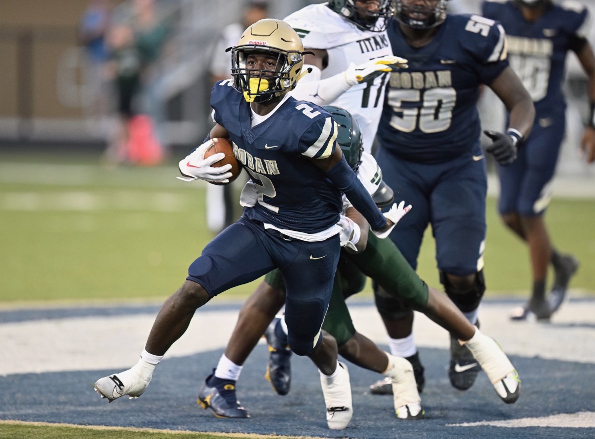 Archbishop Hoban's Xavier Williams runs the ball against Trinity Episcopal on September 2, 2023. He had two touchdown runs for the Knights in their regional final win over Walsh Jesuit on November 17, 2023. Photo credit: Jeff Harwell, SBLive Sports 