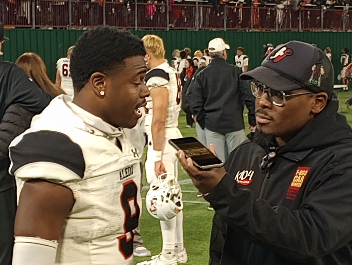 Aledo sophomore tailback Raycine Guillory (left) speaks with the media following the Bearcats' playoff win on Nov. 24, 2023.