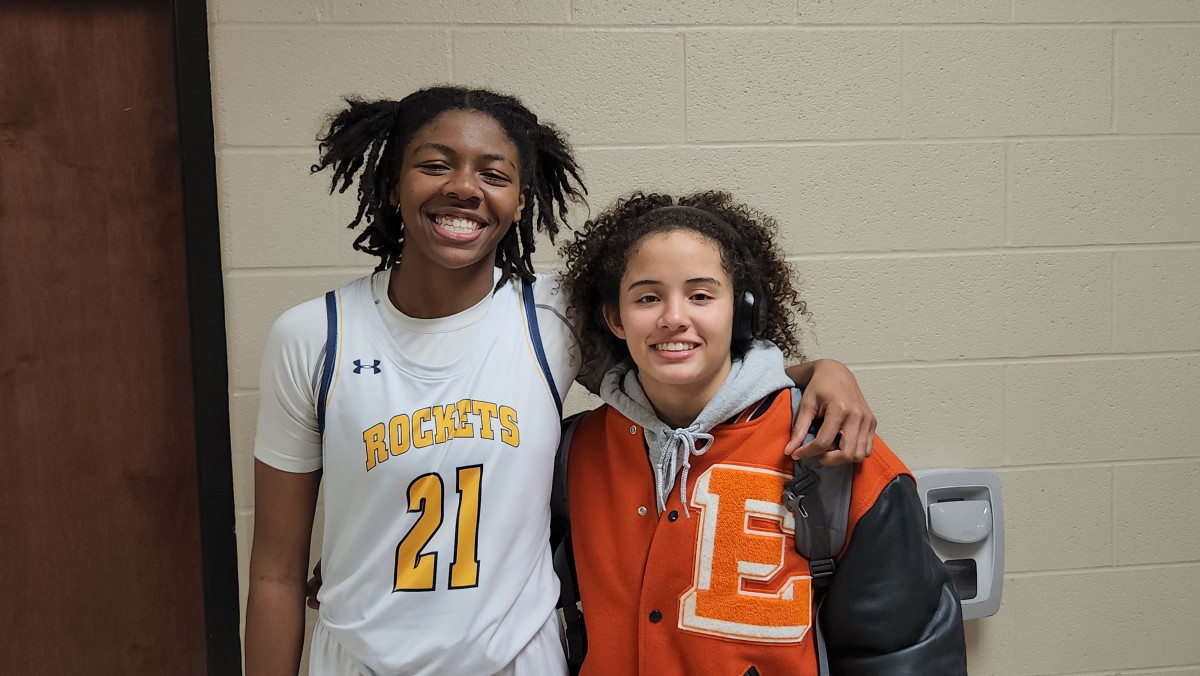 Streetsboro's Naomi Benson and Ellet's Caitlyn Holmes take time for a photo after playing each other on November 28, 2023. Photo credit: Ryan Isley, SBLive Sports 
