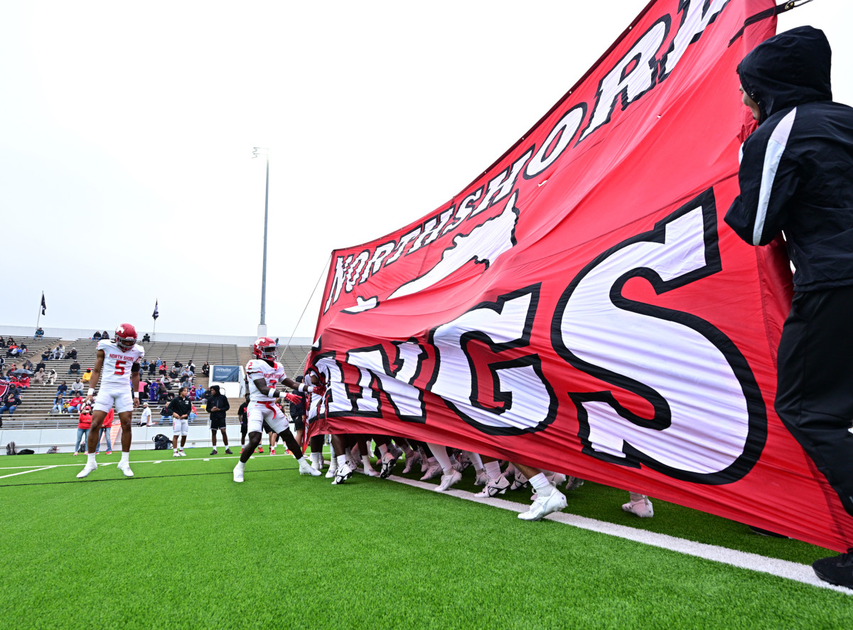 North Shore football players prepare to run onto the field before a UIL 6A Division I regional final playoff game against Atascocita on Dec. 3.