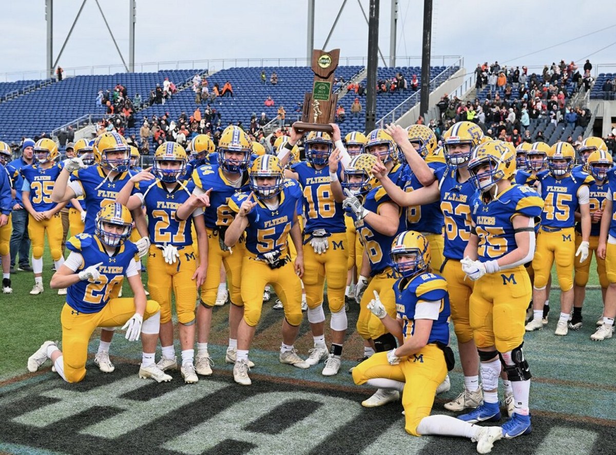 Marion Local players celebrate winning the 2023 OHSAA Division VII state title. Photo credit: Jeff Harwell, SBLive Sports