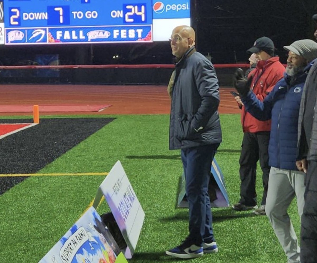 Penn State football coach James Franklin takes in the 4A state championship game between Aliquippa and Dallas.