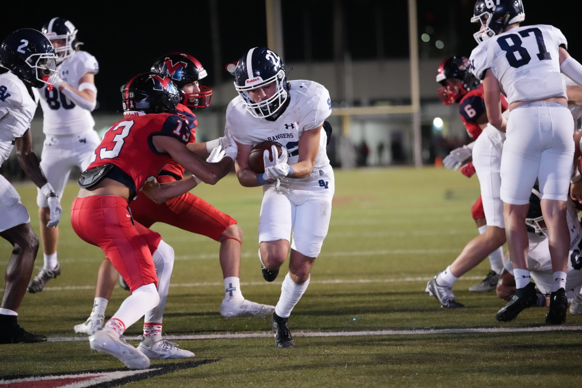 Smithson Valley junior running back Daniel DeHoyos takes a handoff during the first half of the UIL 5A Division I state semifinal at Buc Stadium in Corpus Christi on Friday night. 