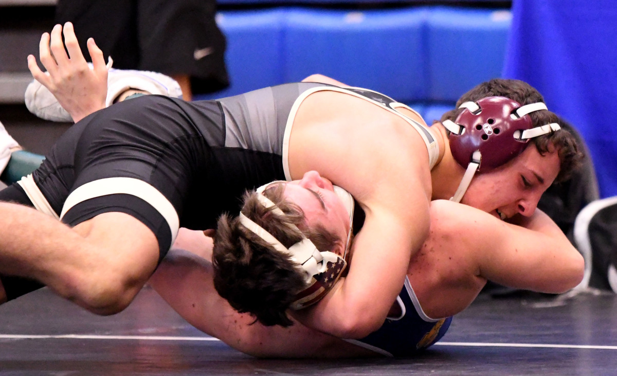 Lake Gibson’s Gianni Maldonado works his way to a pin over Nicholas Gjerde from Charlotte at the 0:54 mark during a 145-pound 2A semifinals match at the FHSAA Duals Wrestling State Championships this past season at Osceola High School in Kissimmee.