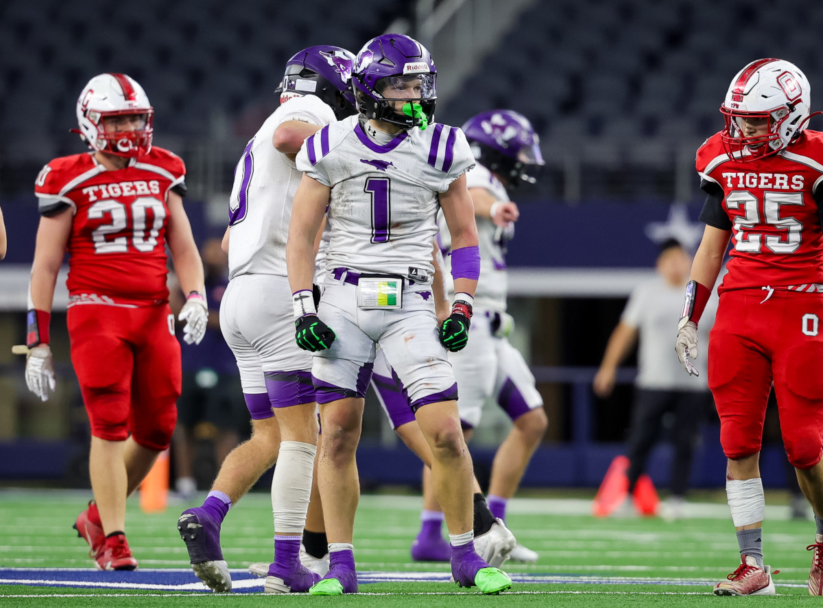 Grayson Rigdon (No. 1) led Benjamin to a 34-point first half lead over Oglesby in the 1A Division II state championship game on Wednesday at AT&T Stadium. in Arlington.