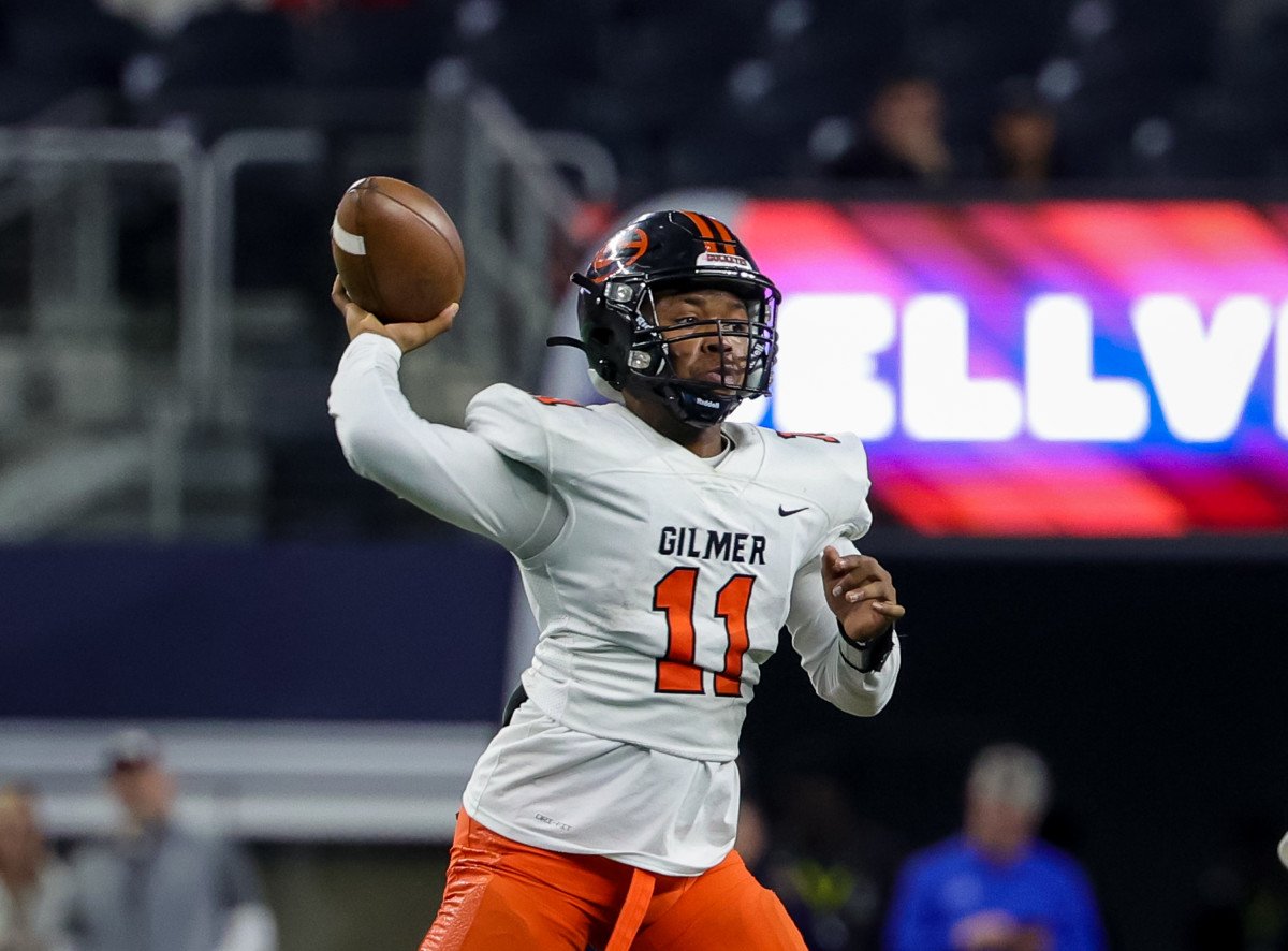 Gilmer QB Cadon Tennison throws a pass during the first half of the 4A Division II state championship football game against Bellville at AT&T Stadium on Friday.