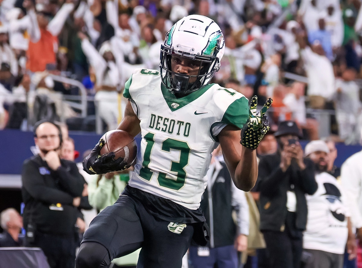 fDeSoto's Daylon Singleton, a four-star junior wide receiver, races toward the endzone during a 6A Division II state championship performance in December. Realignment might change where UIL goes.