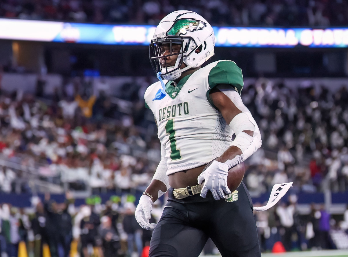 DeSoto backup running back Deondrae Riden, a four-star prospect, celebrates a touchdown during the 6A Division II state championship on Saturday at AT&T Stadium.