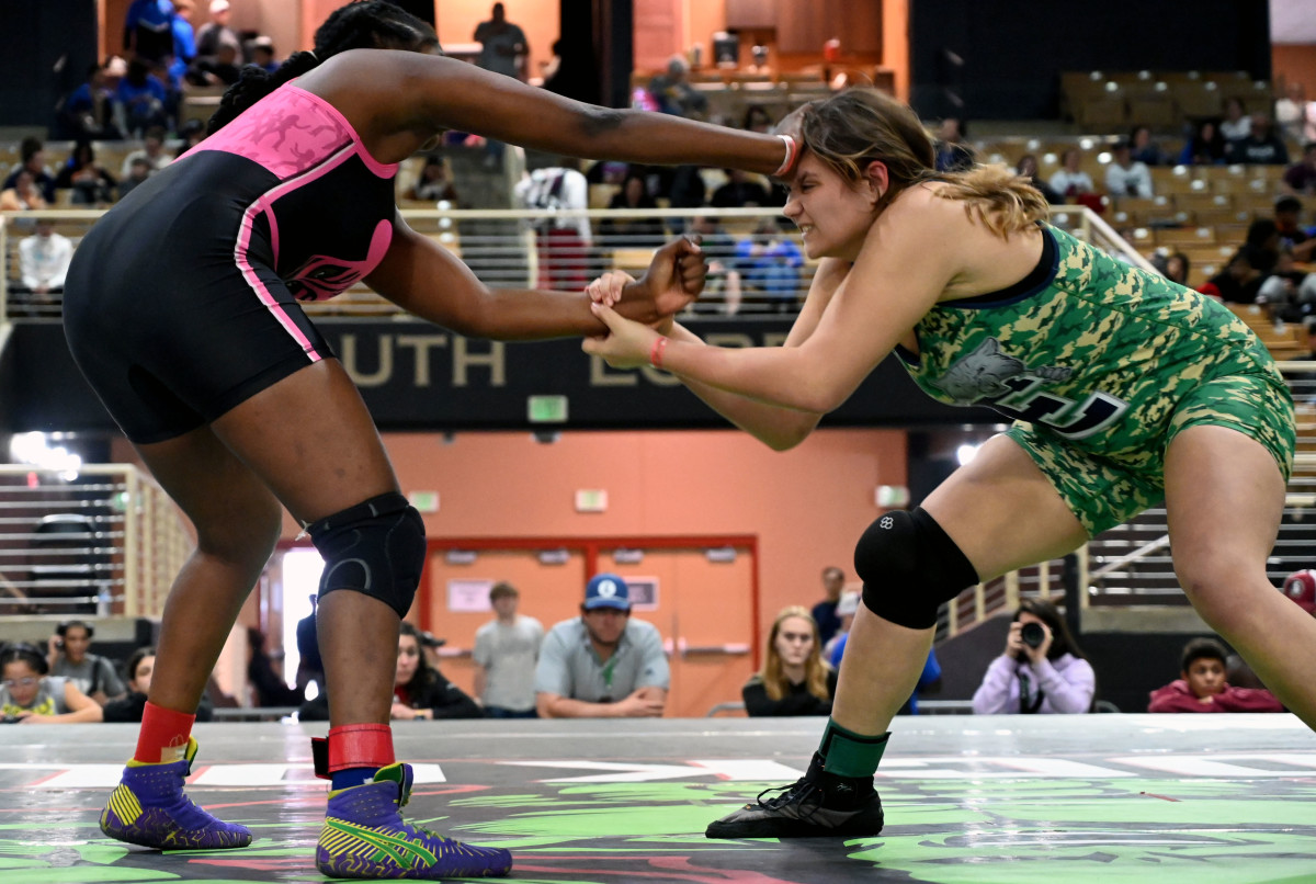 Emari Brown from Harmony picks up the 190-pound title against Mallory Ladd from Enterprise at the Knockout Christmas Classic at Silver Spurs Arena in Kissimmee on Thursday.