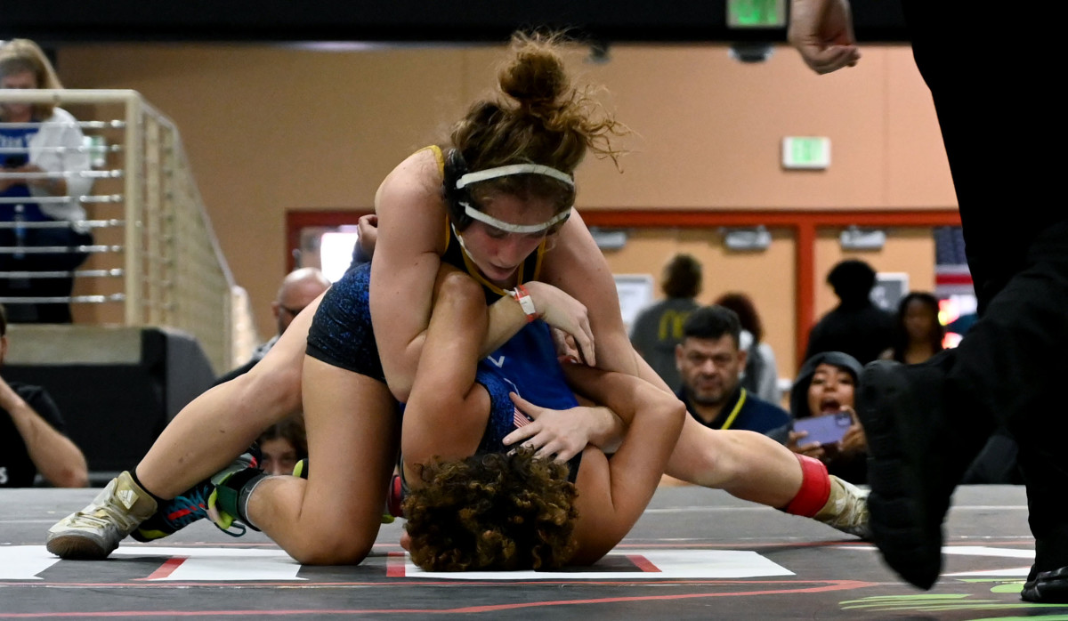 Sydney Bridenstine from Hernando wins the 120-pound title against Delialah Betances from Liberty at the Knockout Christmas Classic at Silver Spurs Arena in Kissimmee on Thursday.