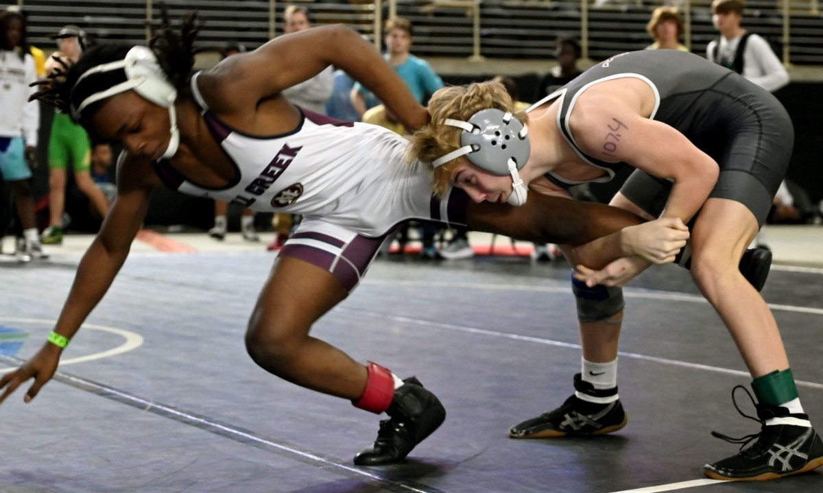 Gabe Swann from Central picks up a semifinals victory over Teequavius Mills from Mill Creek during a 106-pound semifinals match on Saturday at the Knockout Christmas Classic at Silver Spurs Arena in Kissimmee. 