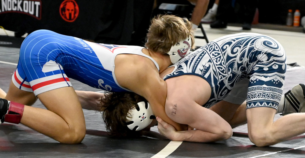 Teague Stroble from West Oak gets a victory against Roman Belardo of Jefferson during 120-pound semifinals match on Saturday at the Knockout Christmas Classic at Silver Spurs Arena in Kissimmee.