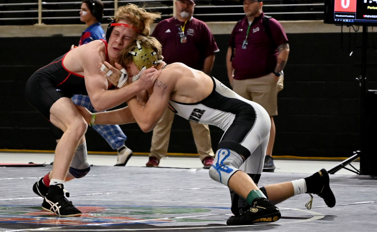 Tanner Spalding from Woodward Academy advances to the finals with a win over Maximus Brady of Mariner in a 132-pound semifinals match on Saturday at the Knockout Christmas Classic at Silver Spurs Arena in Kissimmee. 