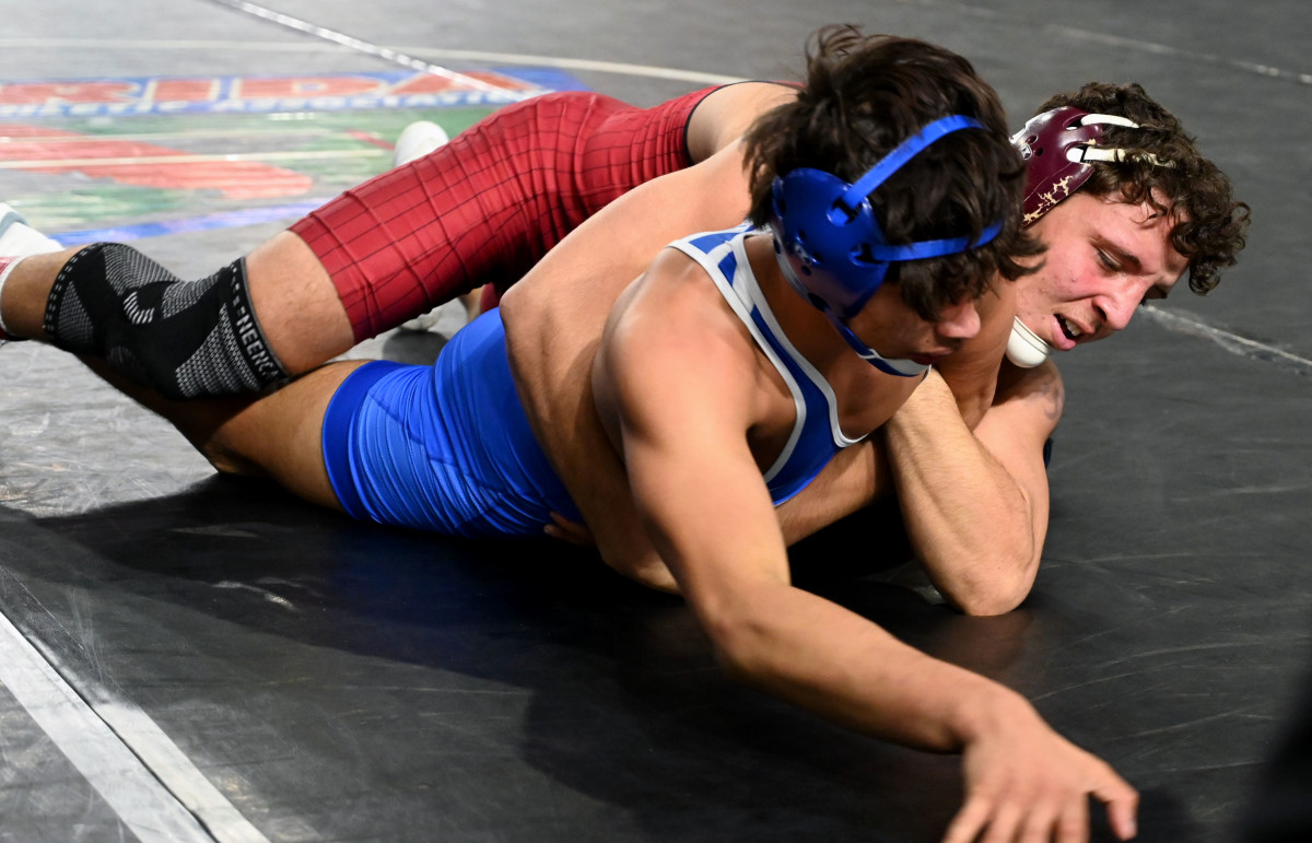 Gianni Maldonado from Lake Gibson gets a win against Kawayran Vazquez of Tampa Jesuit during a 157-pound semifinals match on Saturday at the Knockout Christmas Classic at Silver Spurs Arena in Kissimmee. 
