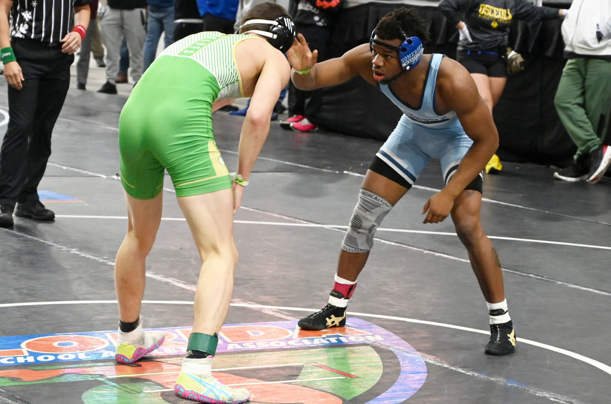 Kendrick Hodge from Somerset advances to the finals with this semifinal win against Grayson Santee of Buford during a 165-pound match on Saturday at the Knockout Christmas Classic at Silver Spurs Arena in Kissimmee. 