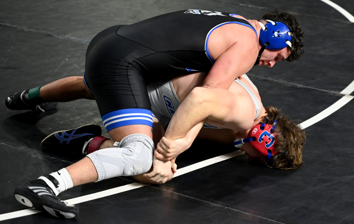 Lucas Szymborski of Cleveland picks up a win against Chris Sanchez from South Dade during a 190-pound semifinals match on Saturday at the Knockout Christmas Classic at Silver Spurs Arena in Kissimmee.
