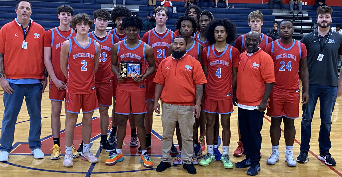 Rockledge gathers with its fifth place trophy on Saturday at the Kingdom in the Sun Tournament at Vanguard High School in Ocala.
