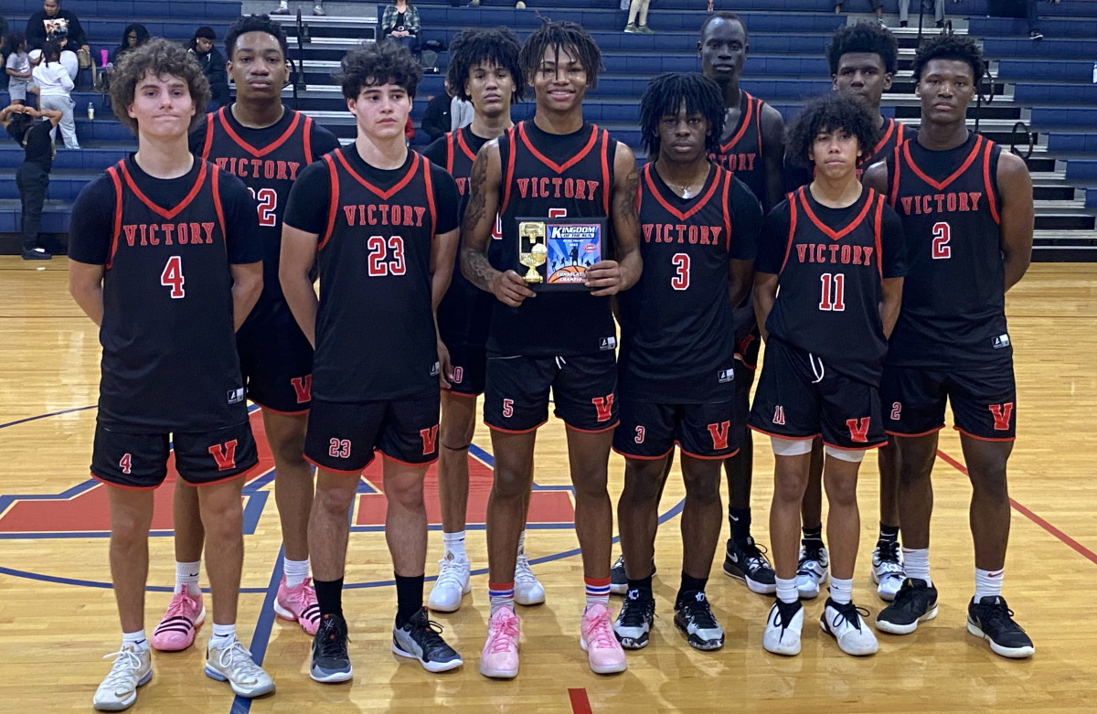 Victory Christian poses with its Consolation Championship trophy on Saturday at the Kingdom in the Sun Tournament at Vanguard High School in Ocala.