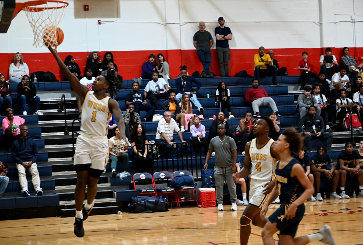 Winter Haven guard Tyrese Mayo goes in for a basket during the first half of the championship game against St. Thomas Aquinas on Saturday at the Kingdom in the Sun Tournament at Vanguard High School in Ocala. 