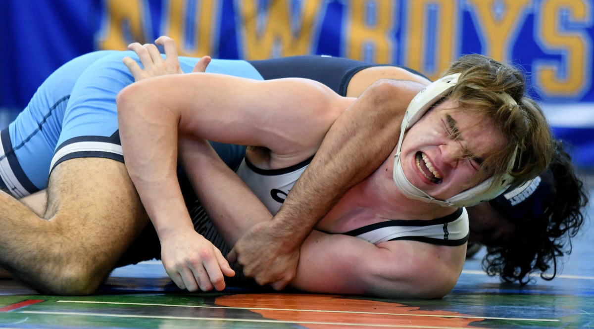 Noah Perez from Somerset picks up a pin win against Torynn Johns from Suwannee during a 175-pound on Saturday at the FHSAA Duals wrestling state championships at Osceola High School.