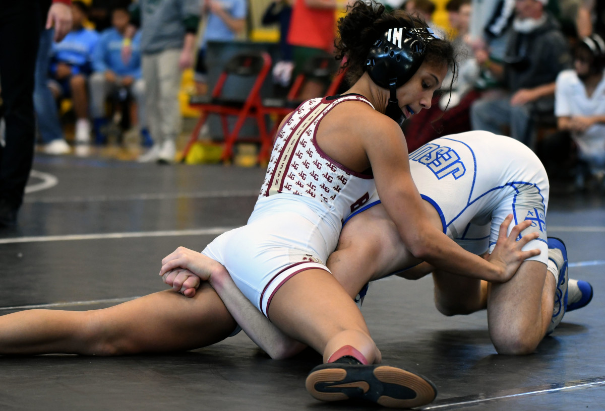 Lake Gibson’s Gabby Tedesco picks up a pivotal win in a 106-pound match against Tampa Jesuit to help deliver the Braves the FHSAA Class 2A Duals wrestling state championship on Saturday at the FHSAA Duals wrestling state championships at Osceola High School.