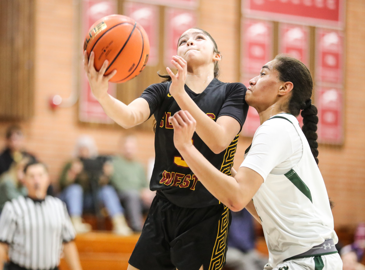 Jasmine Martinez (5) goes to the bucket in an 83-45 win over Maria Carrillo at the Sabrina Ionescu Classic on Jan. 20.  