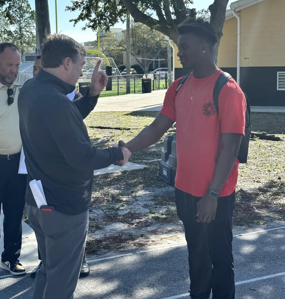 Georgia head coach Kirby Smart shaking hands with Plant RB/LB Waltez Clark (Photo provided by Plant Football)