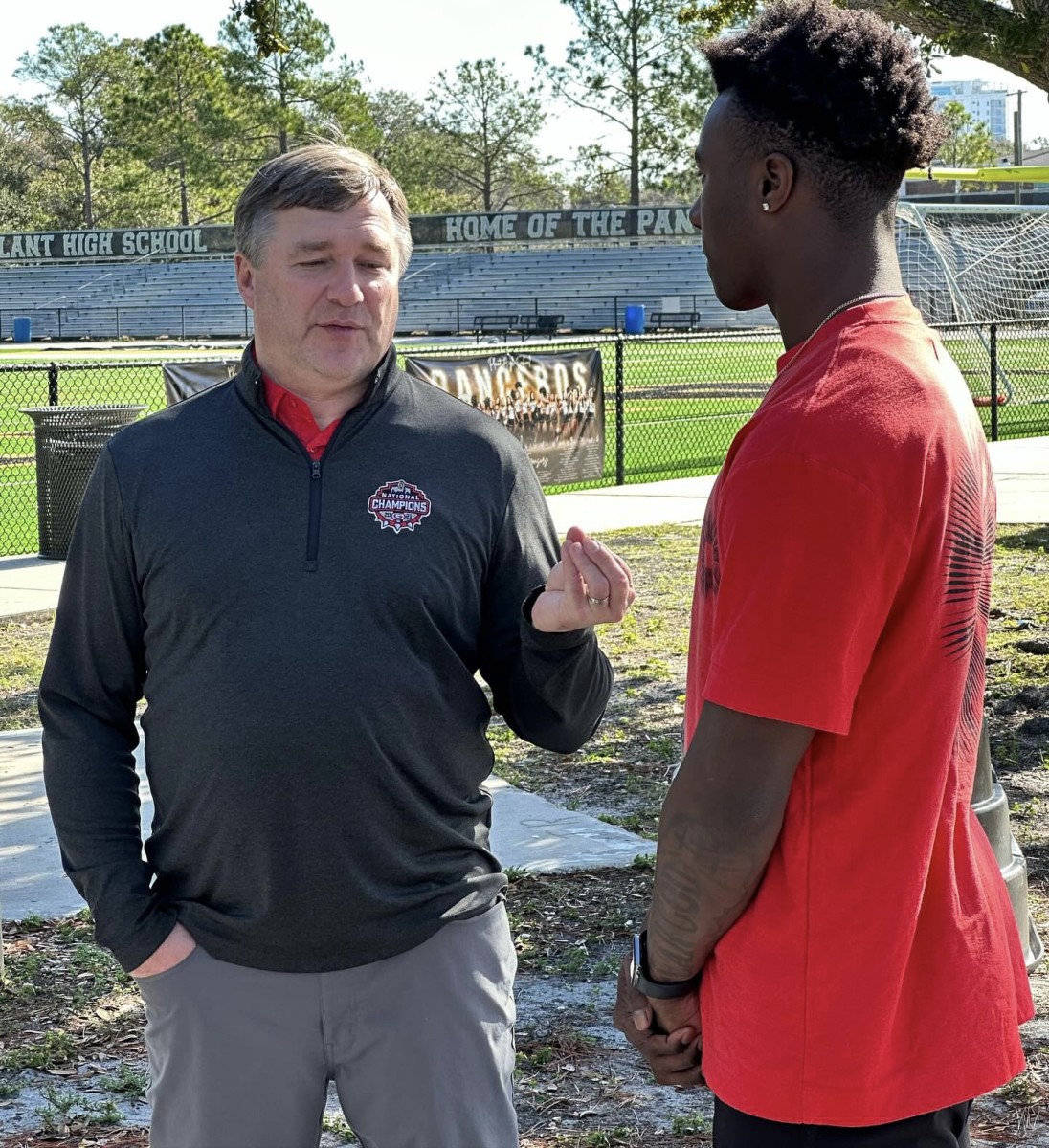 Georgia head coach Kirby Smart talking to Plant RB/LB Waltez Clark (Photo provided by Plant Football)